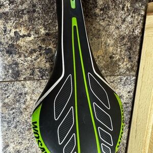 Black and Green Bicycle Saddle